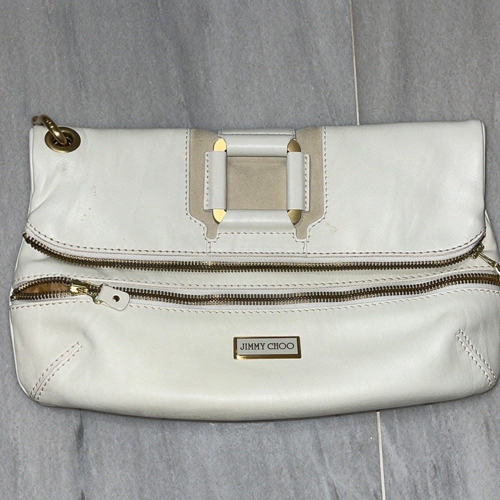 JIMMY CHOO: Gently Used
White Calfskin Leather Marin Oversized Clutch Bag